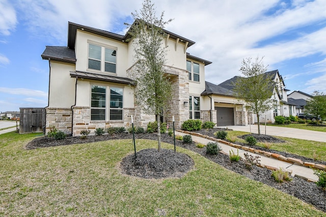 view of front of home with stucco siding, concrete driveway, a garage, stone siding, and a front lawn