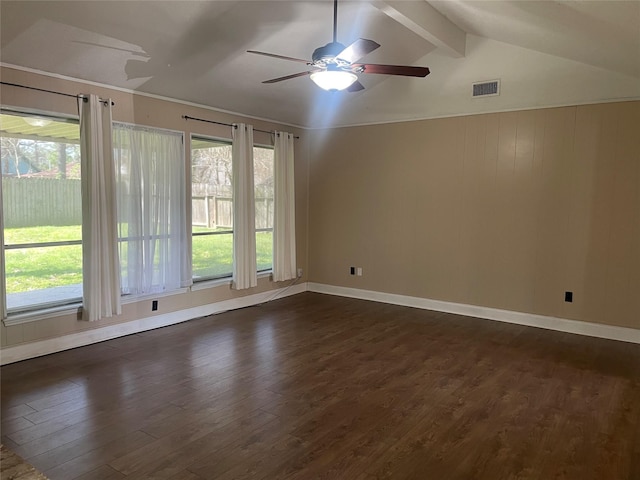 spare room with lofted ceiling with beams, baseboards, visible vents, and dark wood-type flooring