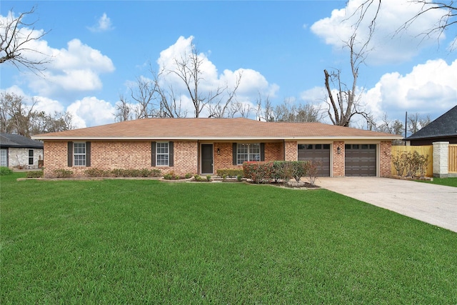 ranch-style house with brick siding, an attached garage, concrete driveway, and a front lawn