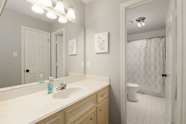 bathroom with a shower with shower curtain, vanity, toilet, and tile patterned floors