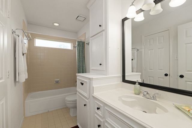 full bath featuring toilet, tile patterned flooring, shower / bath combination with curtain, and vanity