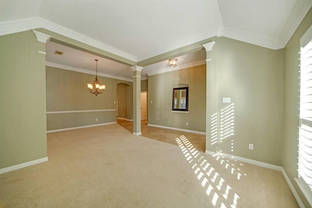 unfurnished room with crown molding, baseboards, light colored carpet, an inviting chandelier, and arched walkways