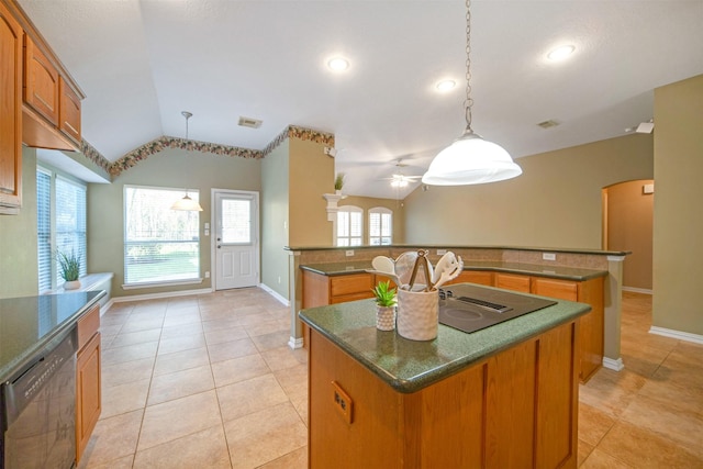 kitchen with black appliances, a kitchen island, arched walkways, brown cabinetry, and lofted ceiling