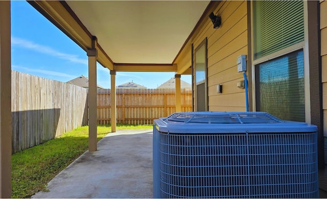 exterior details with fence and central AC unit