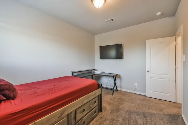 bedroom featuring carpet flooring, visible vents, and baseboards