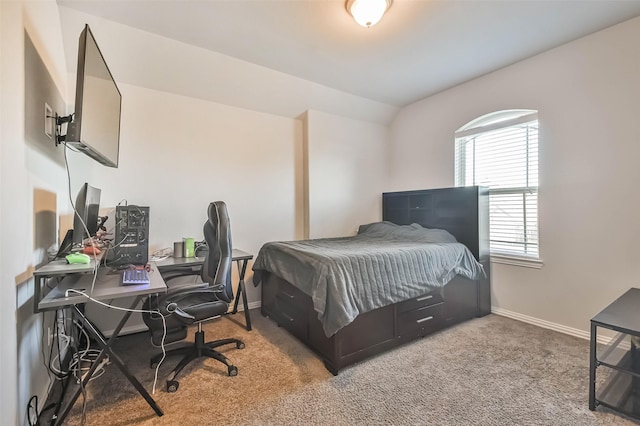 carpeted bedroom with baseboards