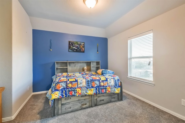 carpeted bedroom with baseboards