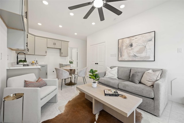 living room with light tile patterned floors, ceiling fan, and recessed lighting