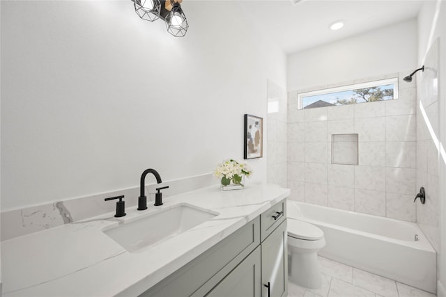 bathroom with toilet, shower / tub combination, and vanity