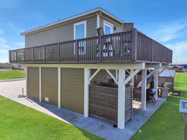 exterior space with a deck and a yard