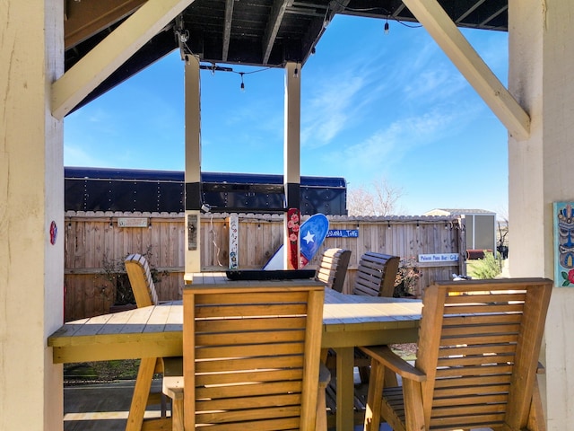 view of patio / terrace with fence and outdoor dining space