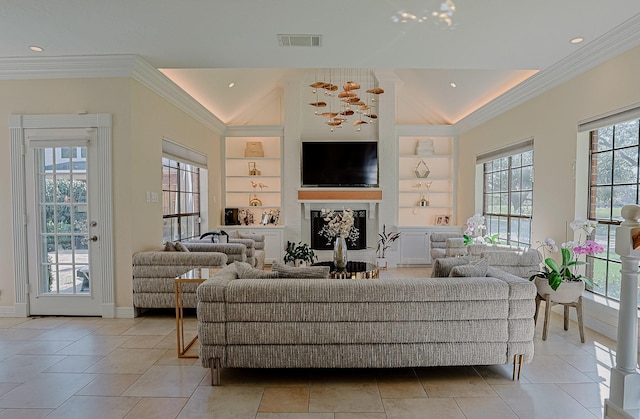 living room with visible vents, built in features, ornamental molding, a fireplace, and recessed lighting