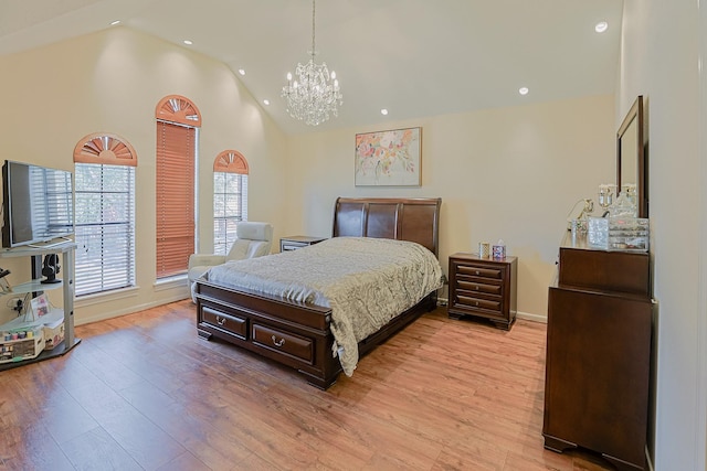 bedroom featuring a notable chandelier, high vaulted ceiling, light wood finished floors, and recessed lighting