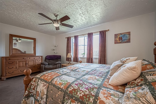 bedroom with ceiling fan, a textured ceiling, and carpet flooring