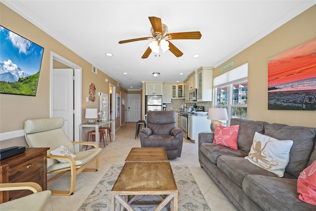 living area featuring light tile patterned floors, visible vents, ceiling fan, crown molding, and recessed lighting