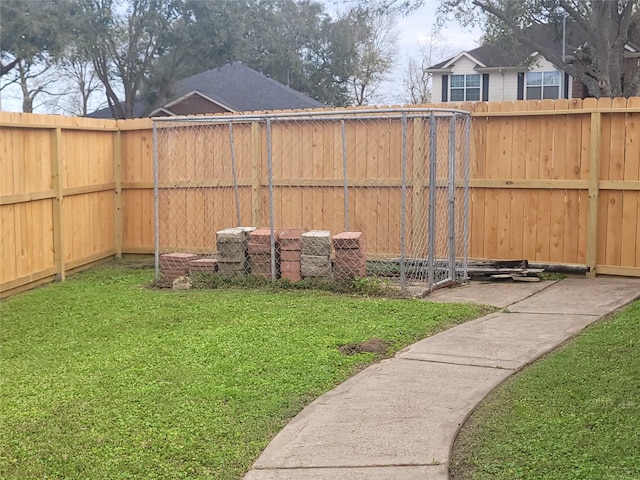 view of yard featuring a fenced backyard