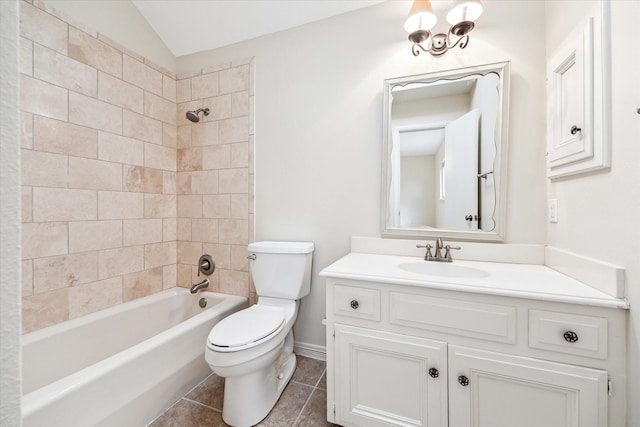 full bathroom with lofted ceiling, toilet, vanity, tub / shower combination, and tile patterned floors