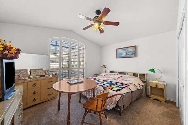 bedroom with vaulted ceiling, ceiling fan, and carpet