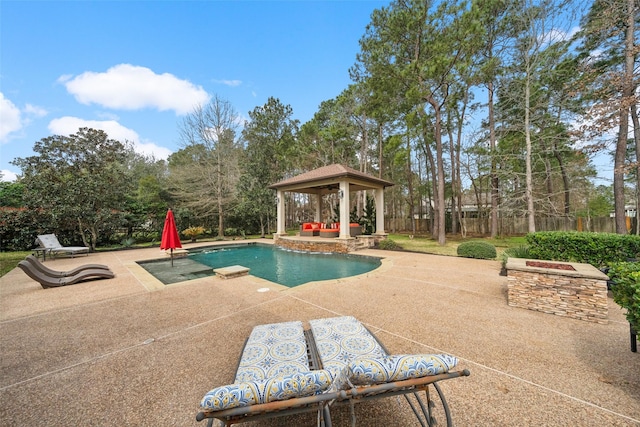 view of pool featuring a gazebo, a patio, and fence