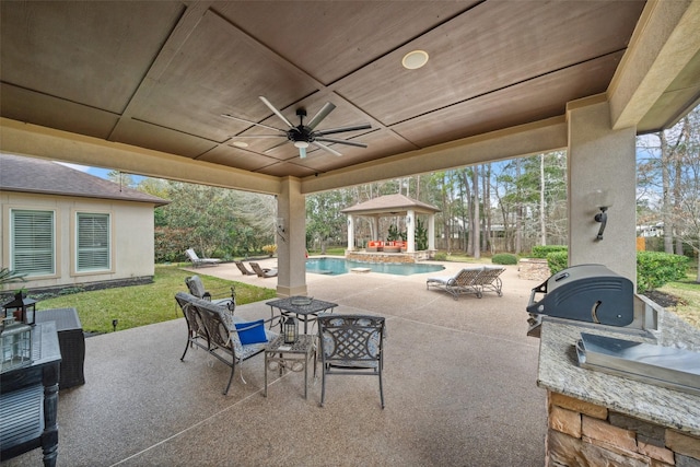 view of patio / terrace with an outdoor pool, area for grilling, ceiling fan, outdoor dining area, and a gazebo