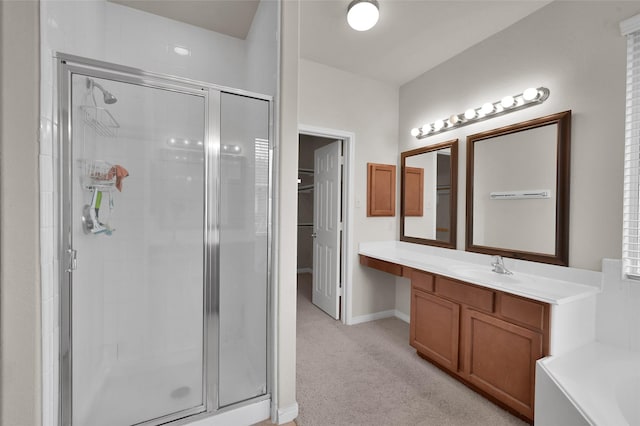 full bath featuring a stall shower, a garden tub, vanity, and baseboards