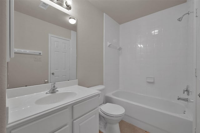 full bathroom with visible vents, toilet, vanity,  shower combination, and tile patterned floors