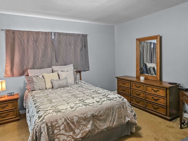 bedroom with light carpet