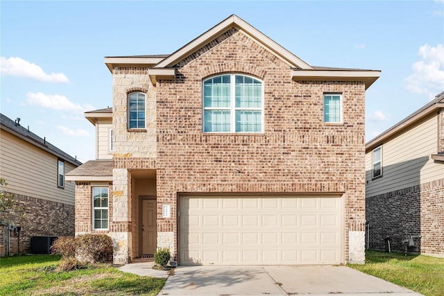 view of front of home with brick siding, central AC unit, a garage, stone siding, and driveway