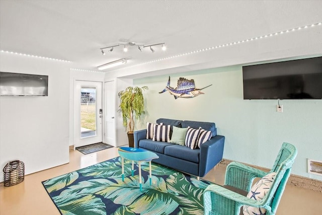 living room featuring concrete flooring