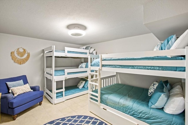 bedroom featuring a textured ceiling