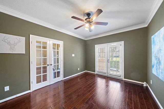 unfurnished room with baseboards, wood finished floors, and french doors