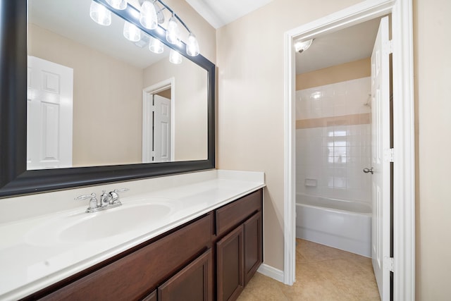 bathroom featuring tile patterned flooring, shower / bath combination, vanity, and baseboards