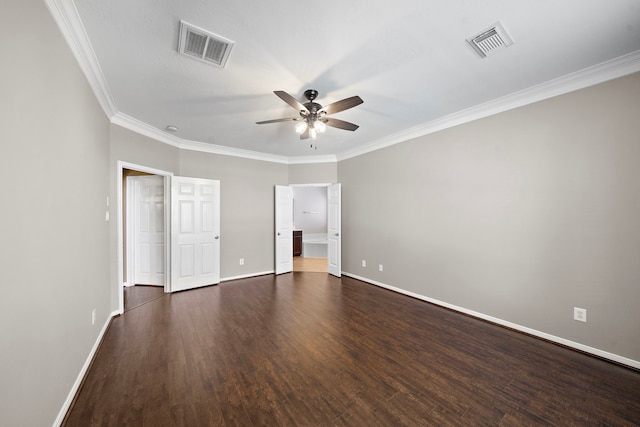 unfurnished bedroom with baseboards, visible vents, dark wood-type flooring, and ornamental molding