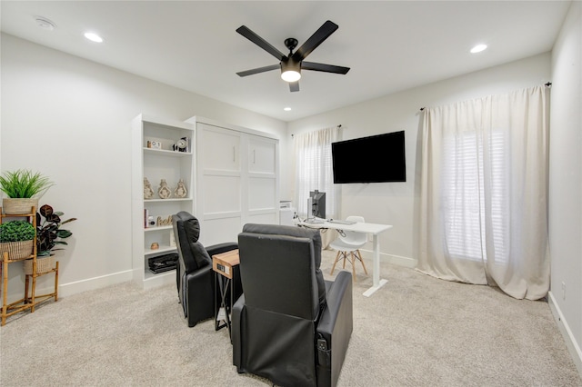 office area featuring a ceiling fan, recessed lighting, light colored carpet, and baseboards