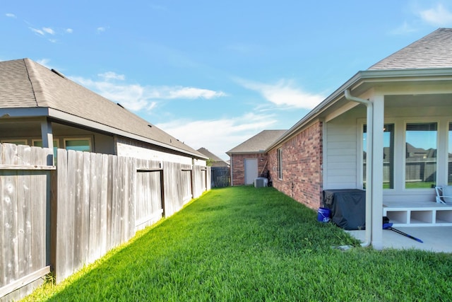 view of yard with fence