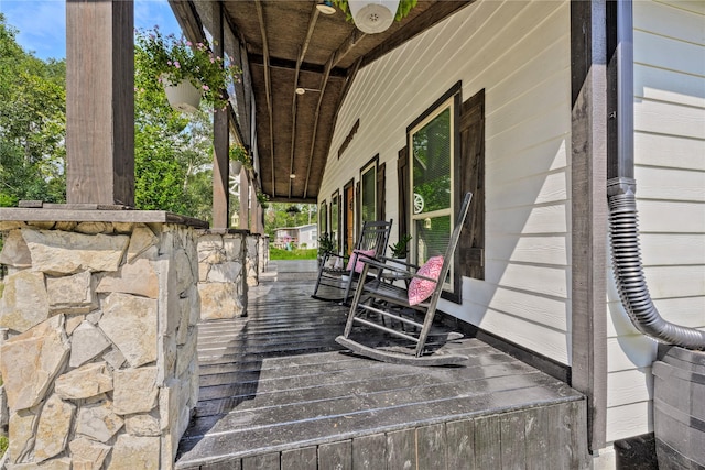 wooden deck featuring covered porch