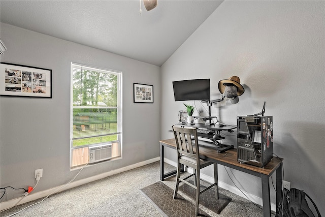 home office with baseboards, a ceiling fan, vaulted ceiling, cooling unit, and carpet floors