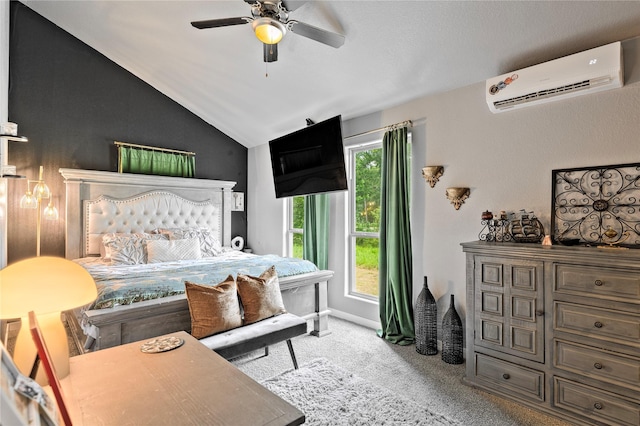 carpeted bedroom featuring a wall mounted air conditioner, vaulted ceiling, and ceiling fan