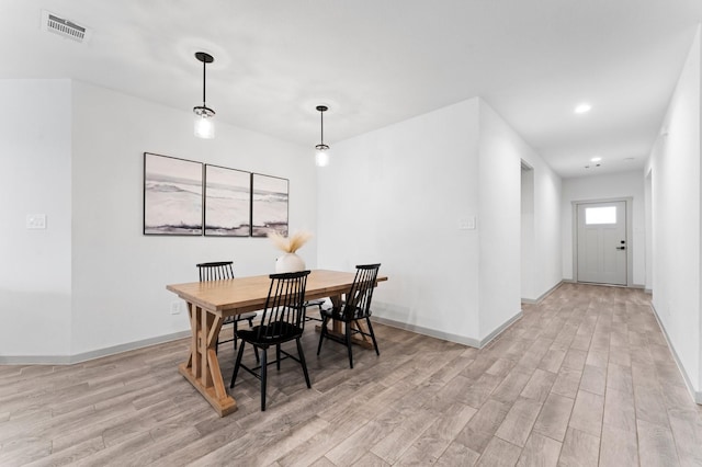 13220 Lago Acero Ln, Texas City, TX 77568 - dining room featuring light wood-style flooring and recessed lighting