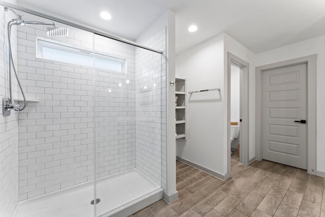 13220 Lago Acero Ln, Texas City, TX 77568 - bathroom featuring a shower stall, wood tiled floors, and recessed lighting