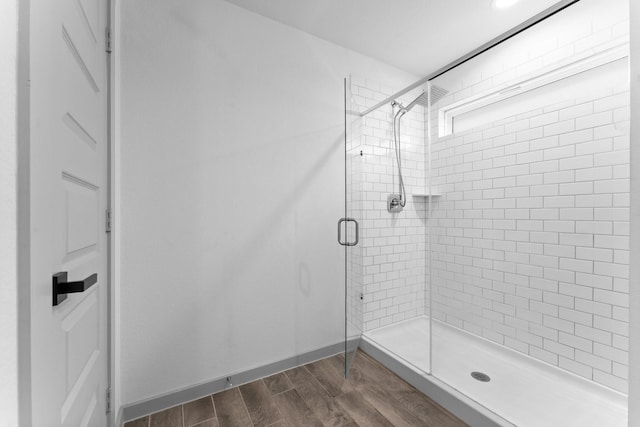 13220 Lago Acero Ln, Texas City, TX 77568 - bathroom featuring a shower stall and wood finished floors