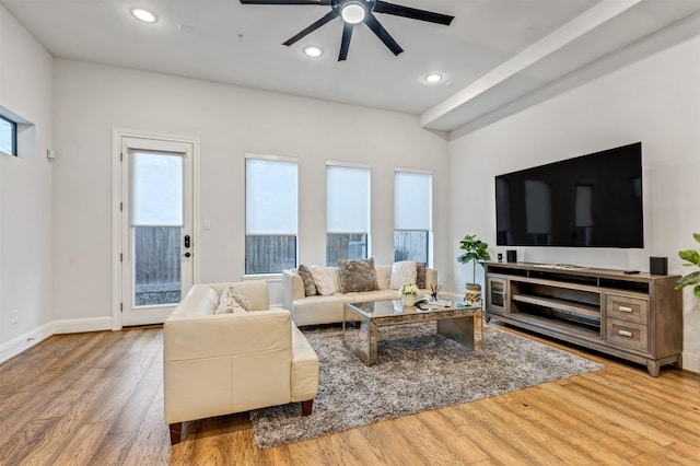 living room with a ceiling fan, baseboards, wood finished floors, and recessed lighting