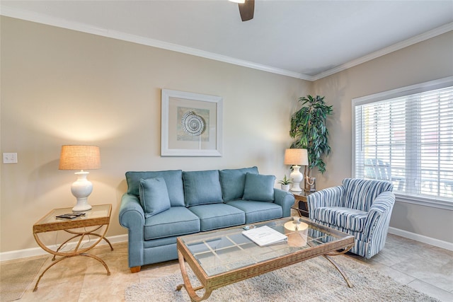 living room featuring light tile patterned floors, baseboards, ornamental molding, and a ceiling fan