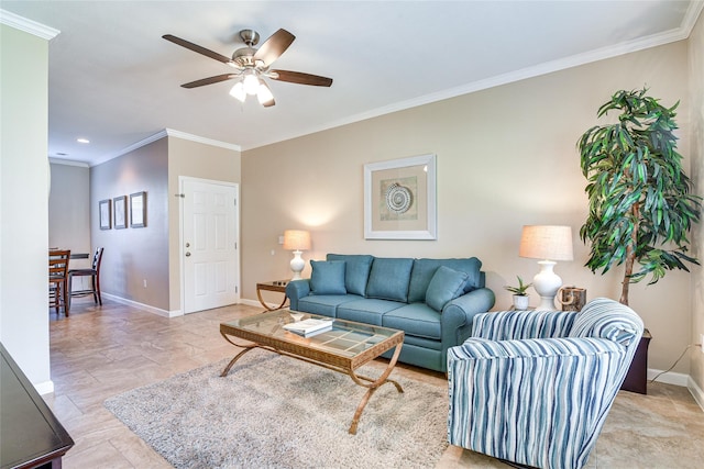 living area featuring crown molding, baseboards, and ceiling fan