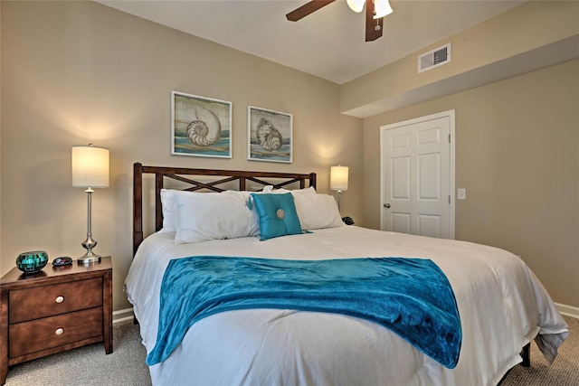 bedroom featuring ceiling fan, carpet flooring, visible vents, and baseboards