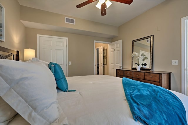 bedroom featuring visible vents and ceiling fan