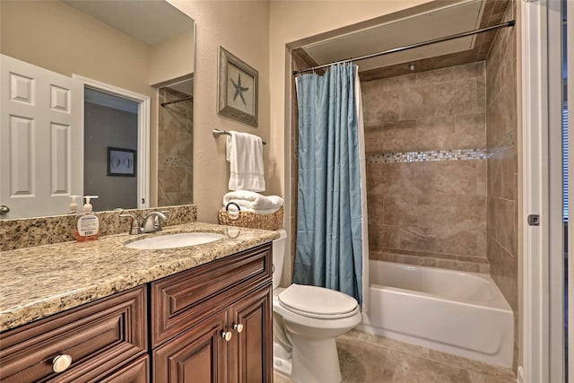 bathroom with toilet, tile patterned flooring, shower / bath combo with shower curtain, and vanity