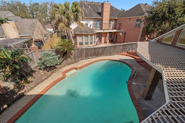 pool with a fenced backyard