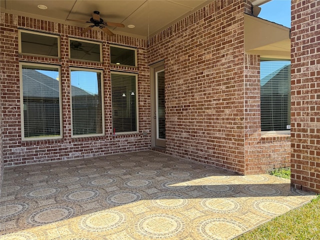 view of patio / terrace featuring a ceiling fan