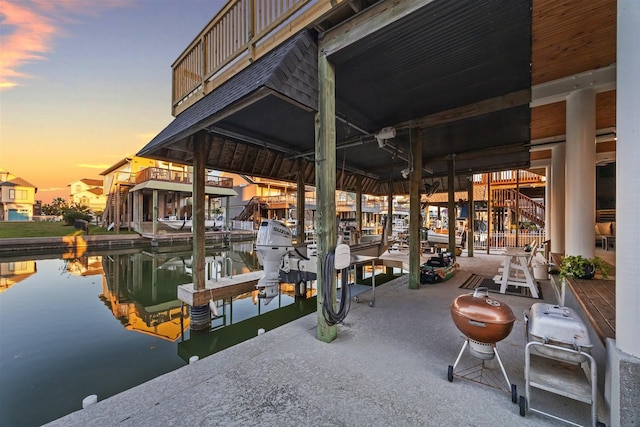 view of dock with a water view and boat lift